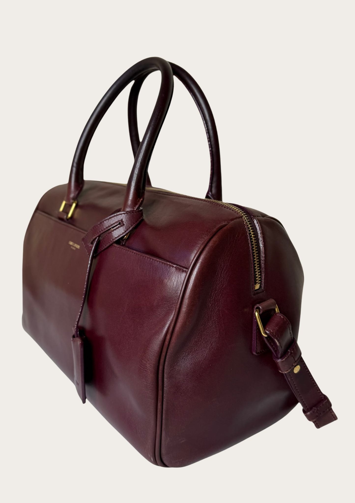 Authentic Saint Laurent Duffle bag (medium) in burgundy red