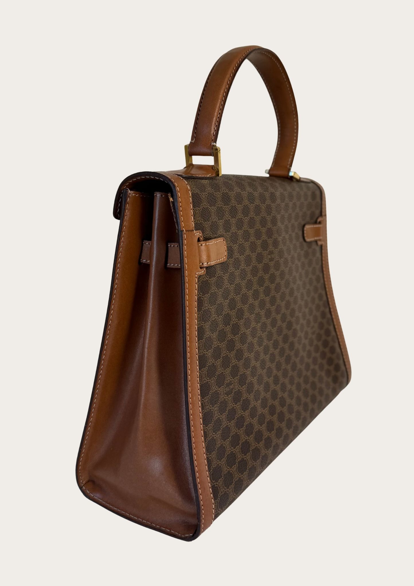 Authentic and vintage Celine top handle bag in macadam pattern