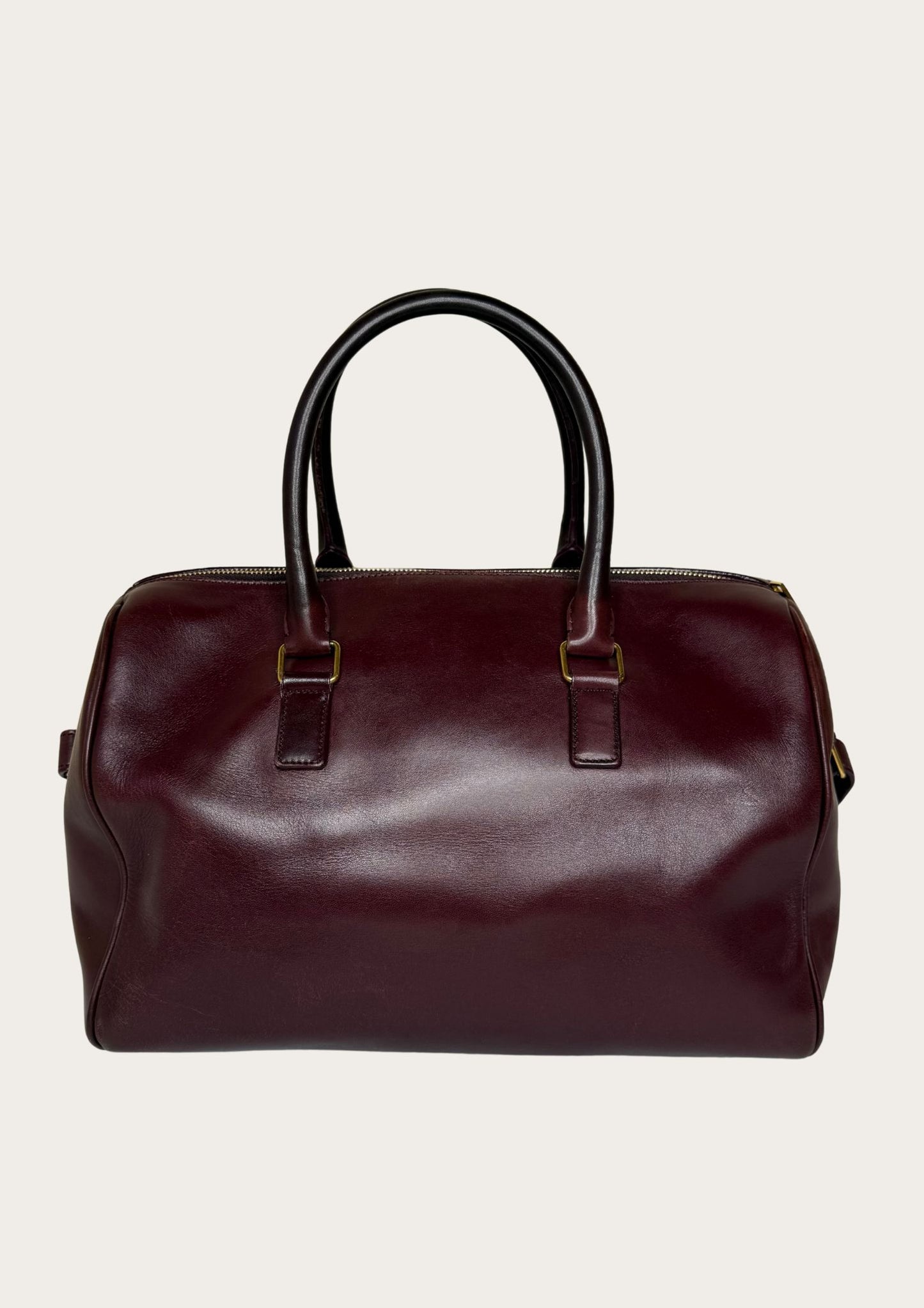 Authentic Saint Laurent Duffle bag (medium) in burgundy red