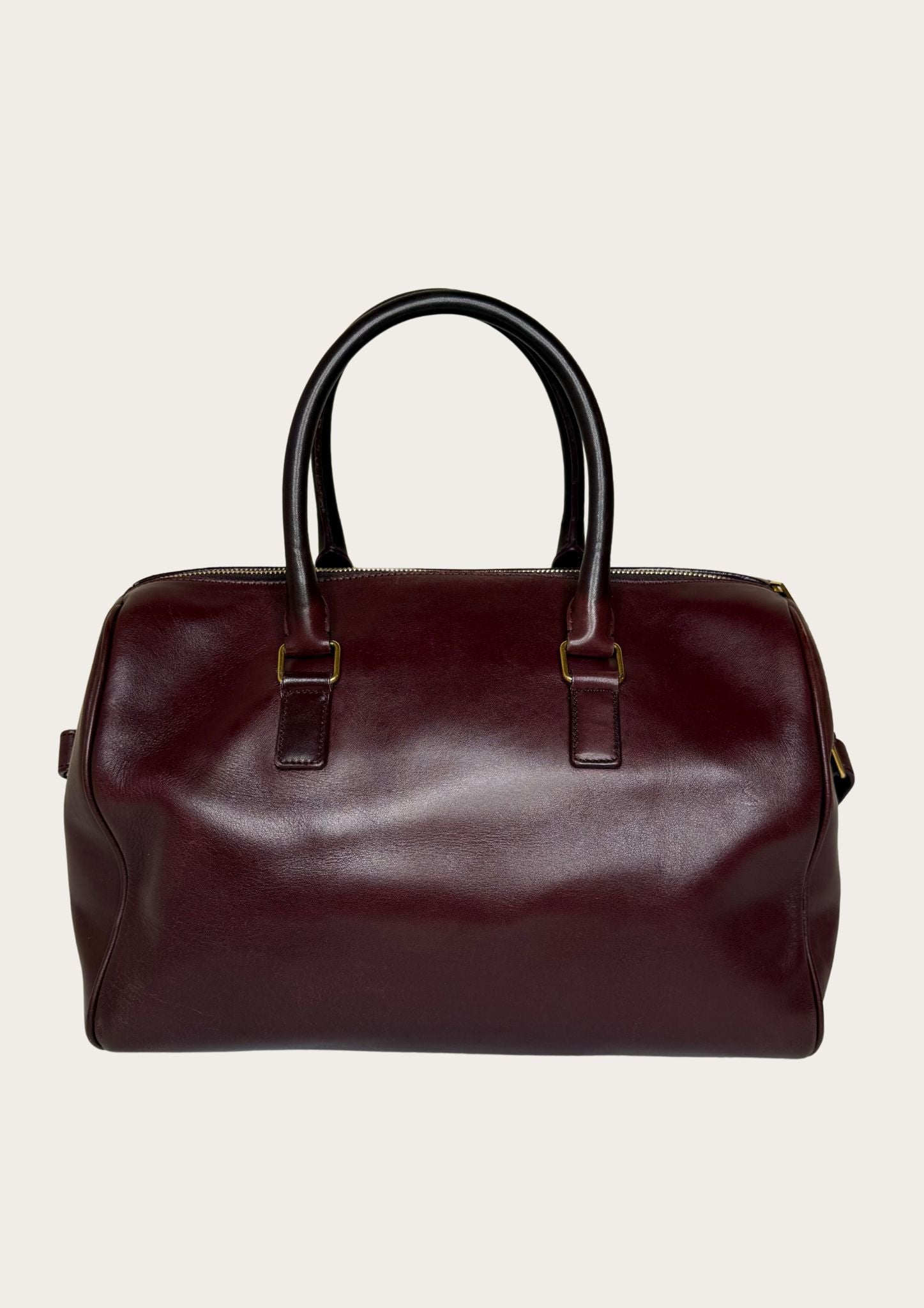 Authentic Saint Laurent Duffle bag (medium) in burgundy red