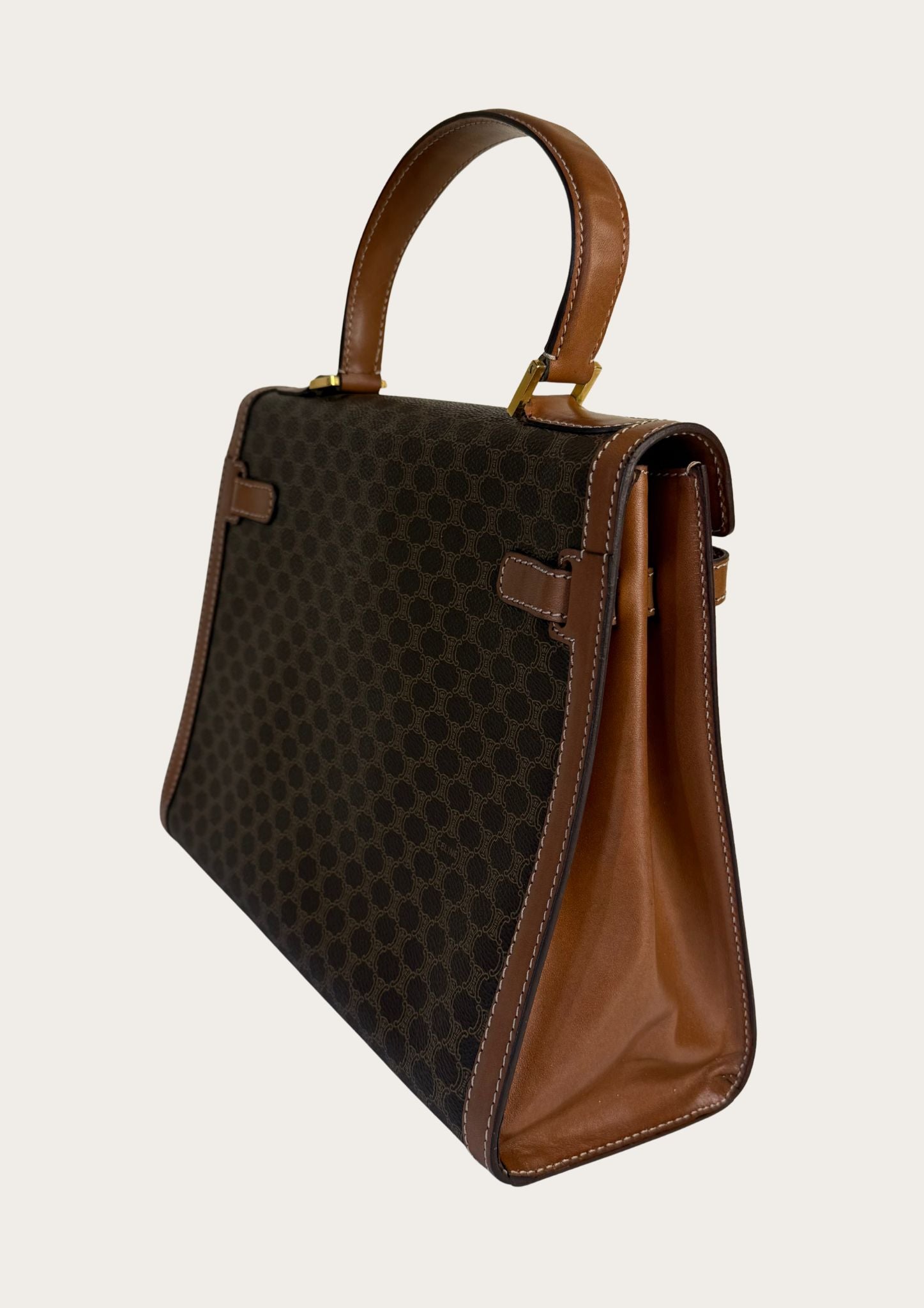 Authentic and vintage Celine top handle bag in macadam pattern