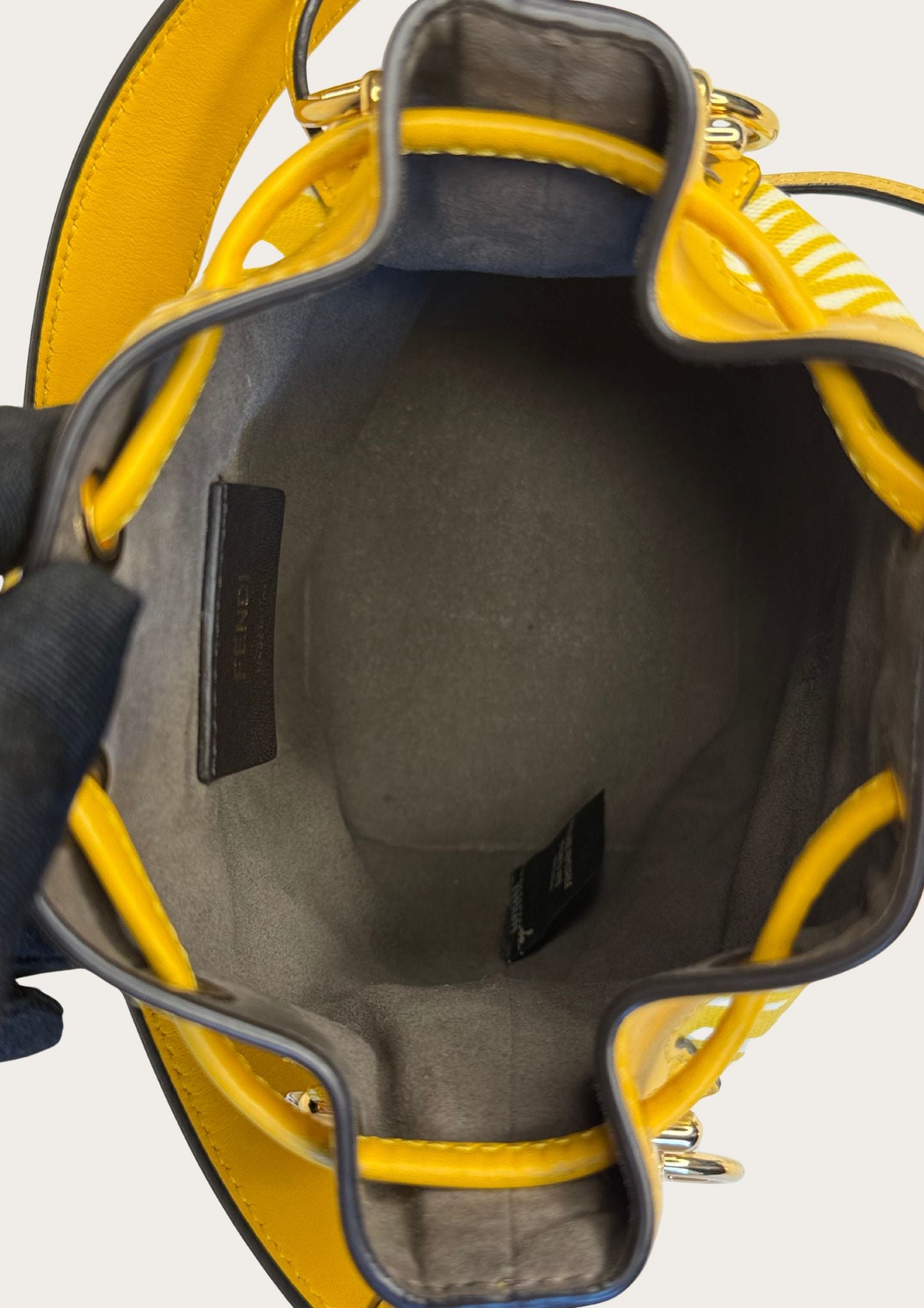 Genuine Fendi Mon Trésor Mini Bucket Bag in yellow and white canvas and leather