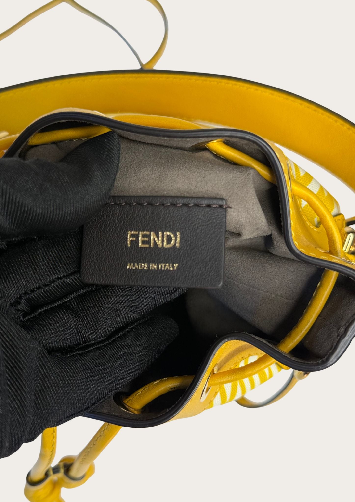 Genuine Fendi Mon Trésor Mini Bucket Bag in yellow and white canvas and leather