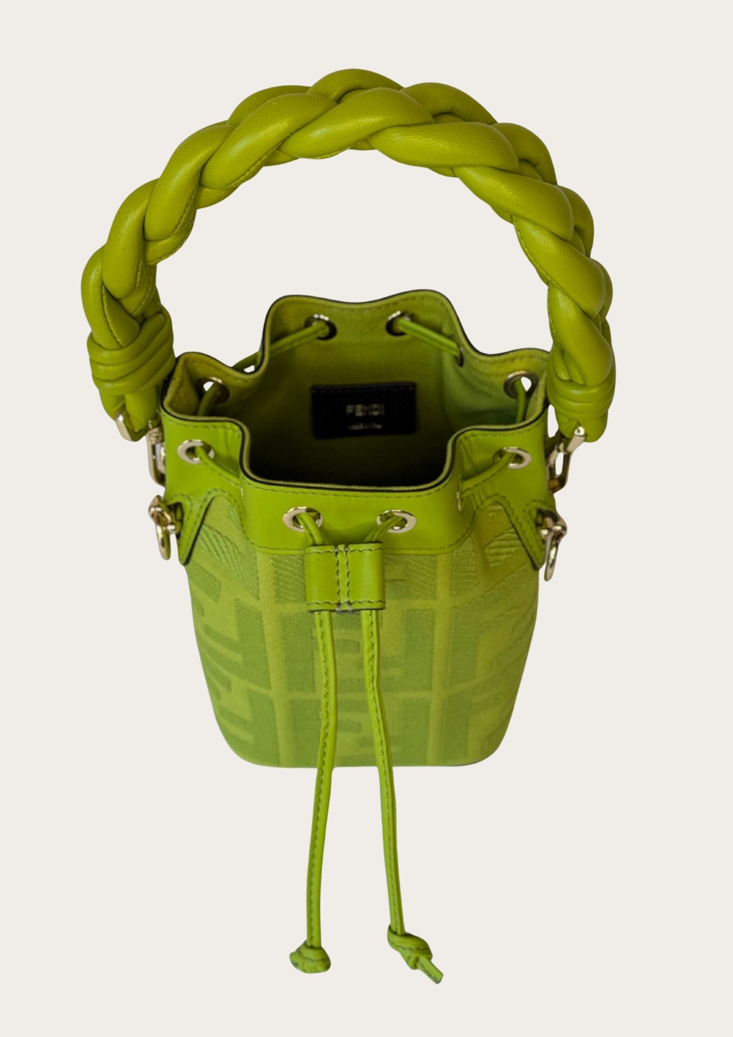 Authentic Fendi Mon Trésor Mini Bucket Bag in green canvas with leather details