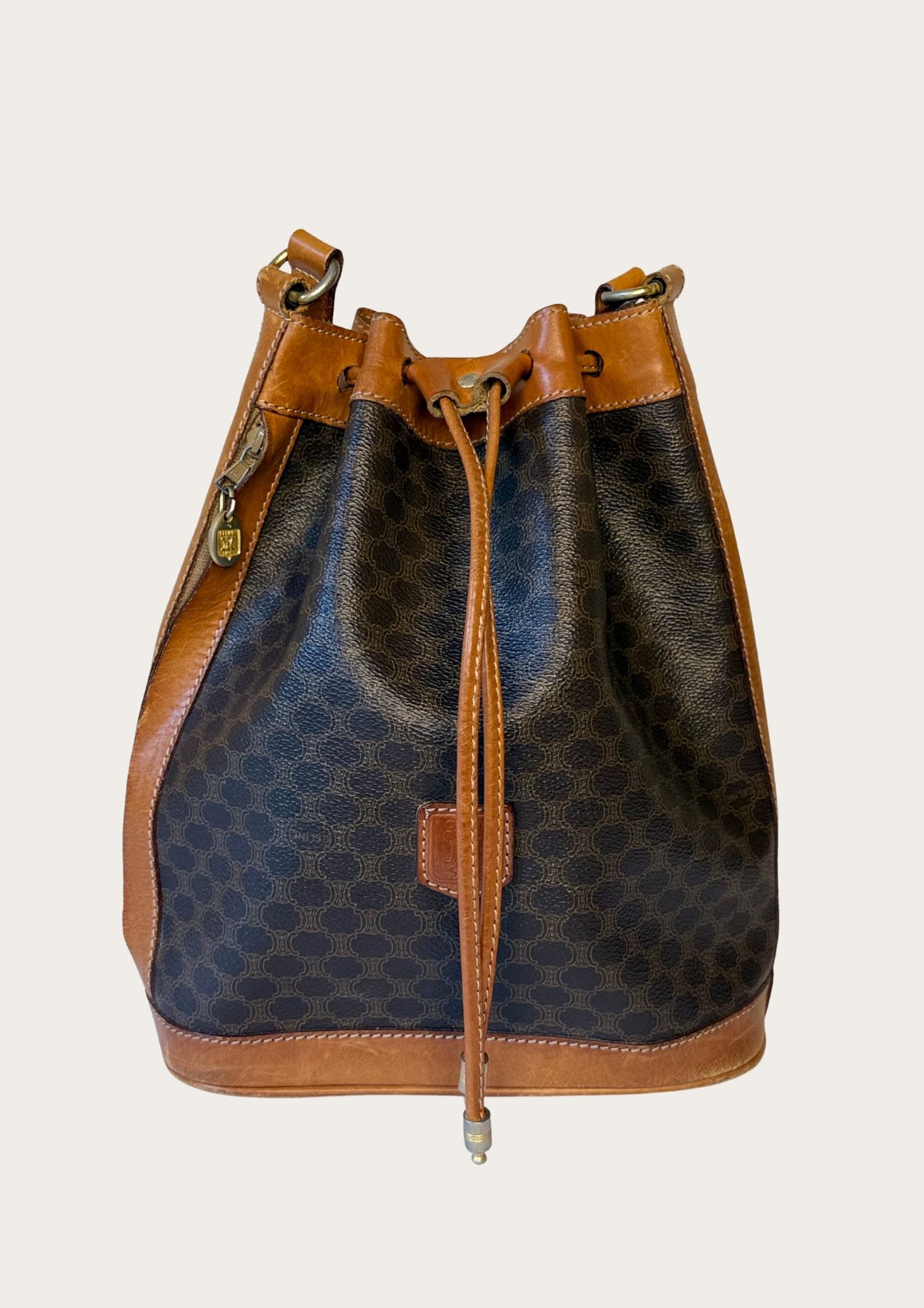 Genuine Celine bucket bag in macadam pattern with leather details