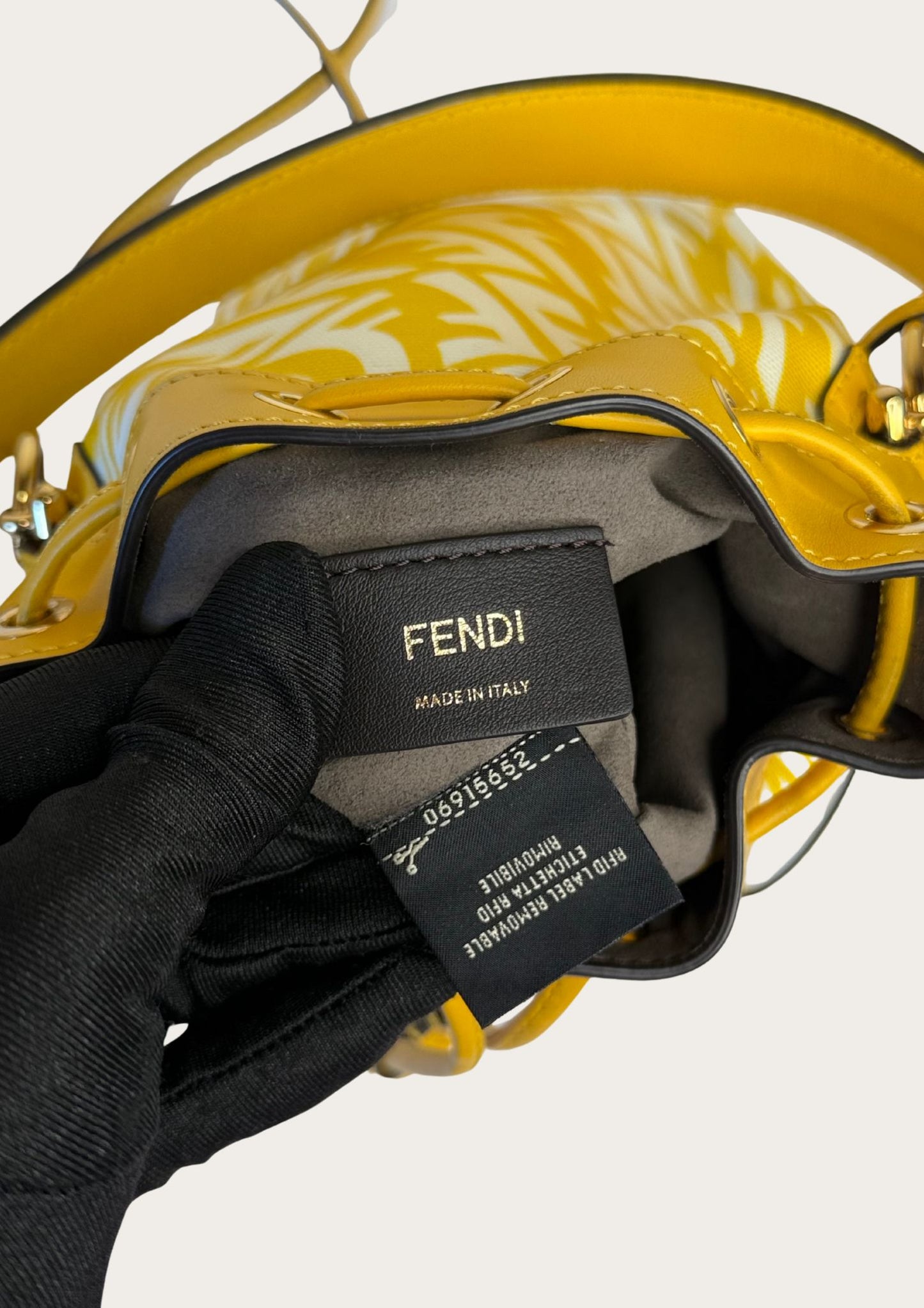 Genuine Fendi Mon Trésor Mini Bucket Bag in yellow and white canvas and leather