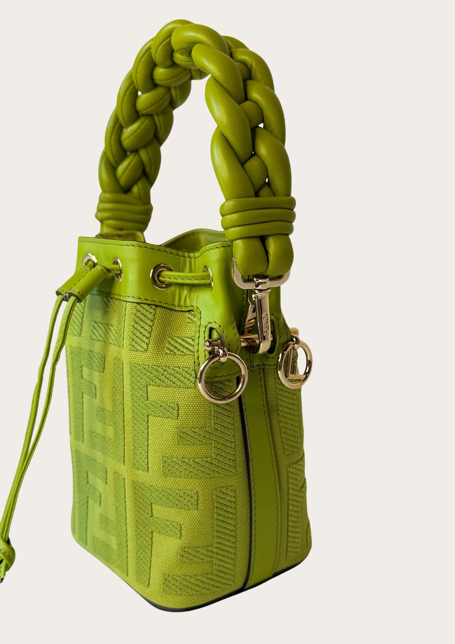 Authentic Fendi Mon Trésor Mini Bucket Bag in green canvas with leather details