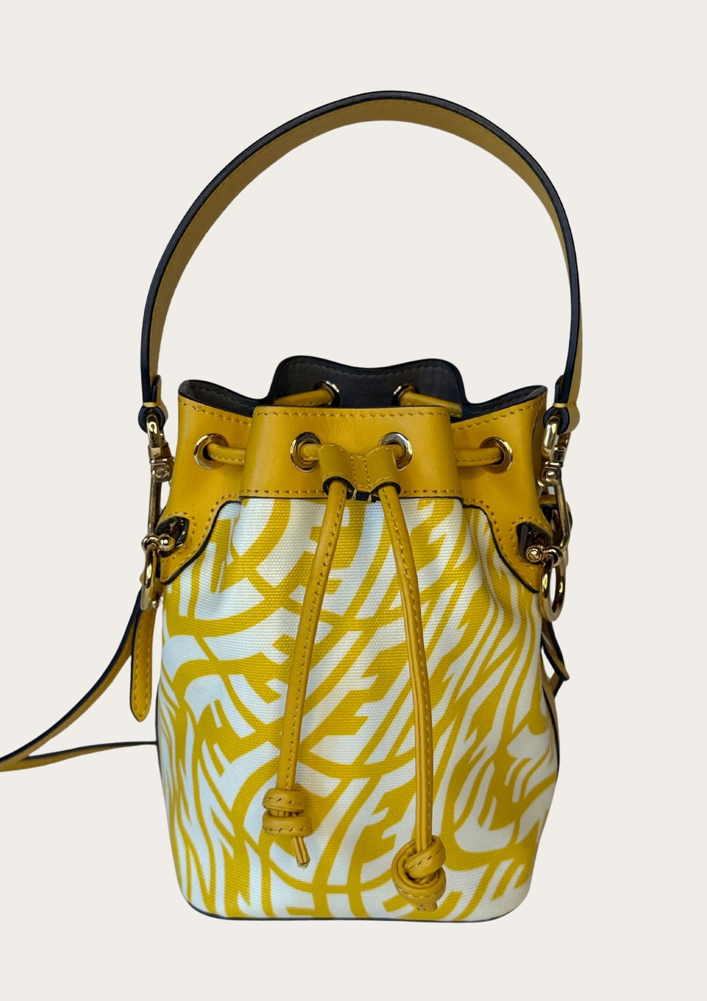 Genuine Fendi Mon Trésor Mini Bucket Bag in yellow and white canvas and leather