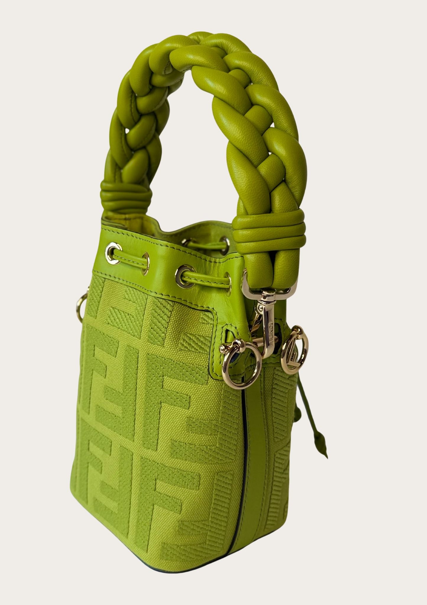 Authentic Fendi Mon Trésor Mini Bucket Bag in green canvas with leather details