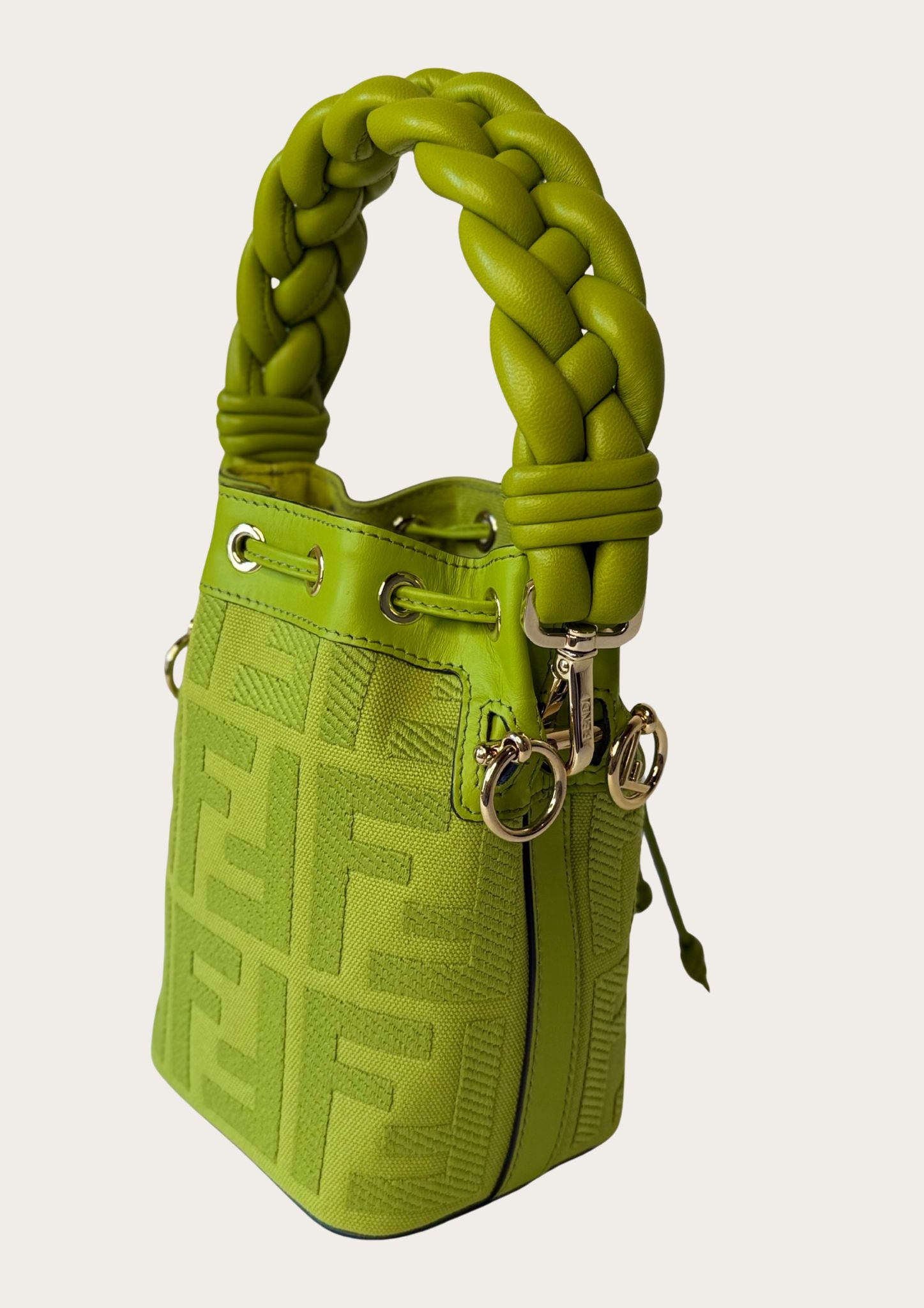 Authentic Fendi Mon Trésor Mini Bucket Bag in green canvas with leather details