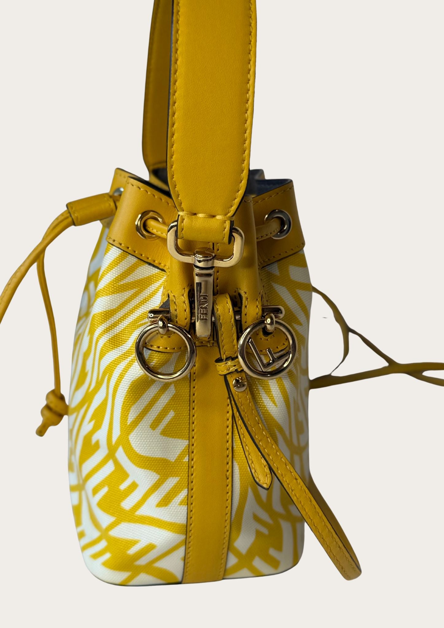 Genuine Fendi Mon Trésor Mini Bucket Bag in yellow and white canvas and leather
