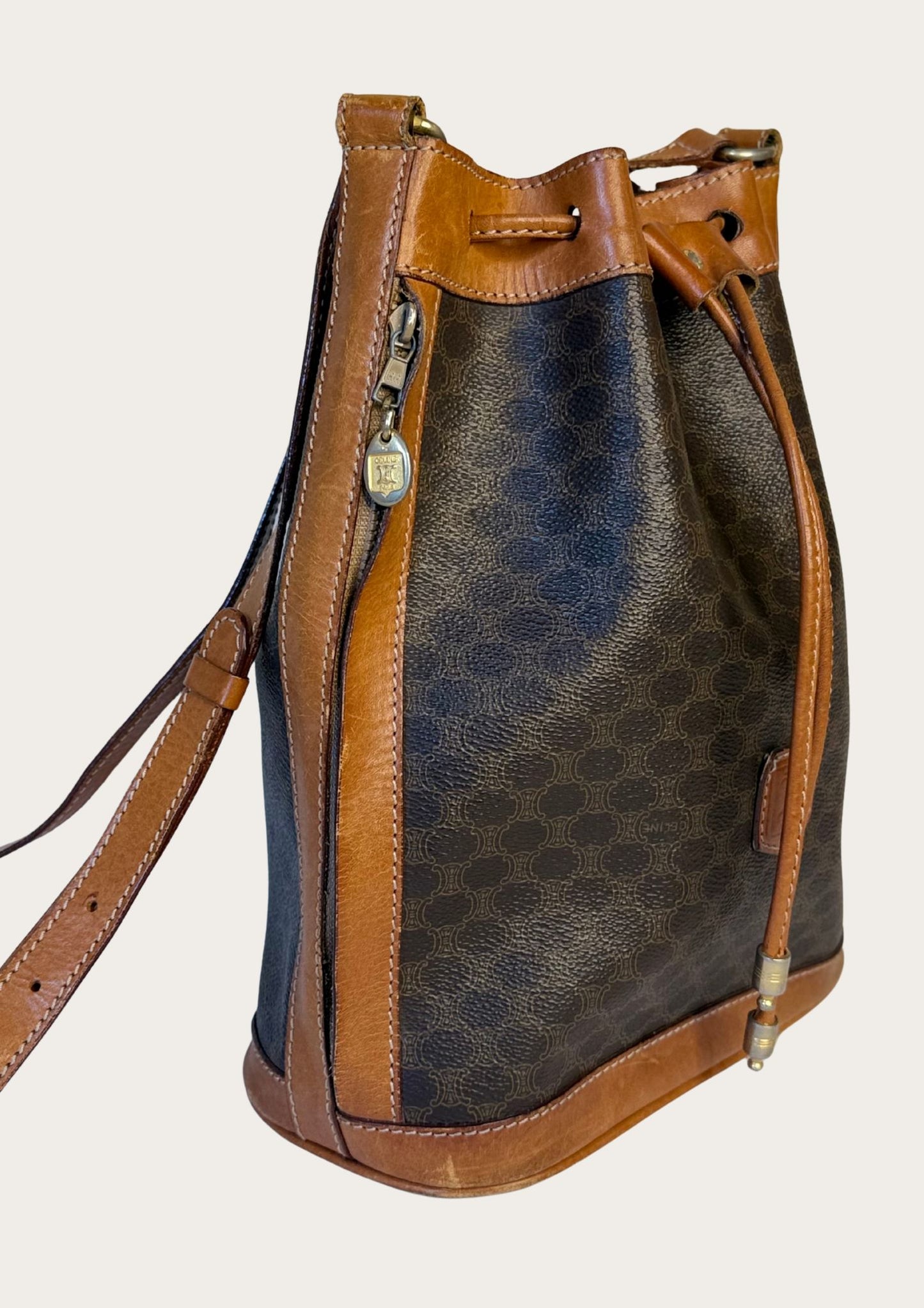 Genuine Celine bucket bag in macadam pattern with leather details