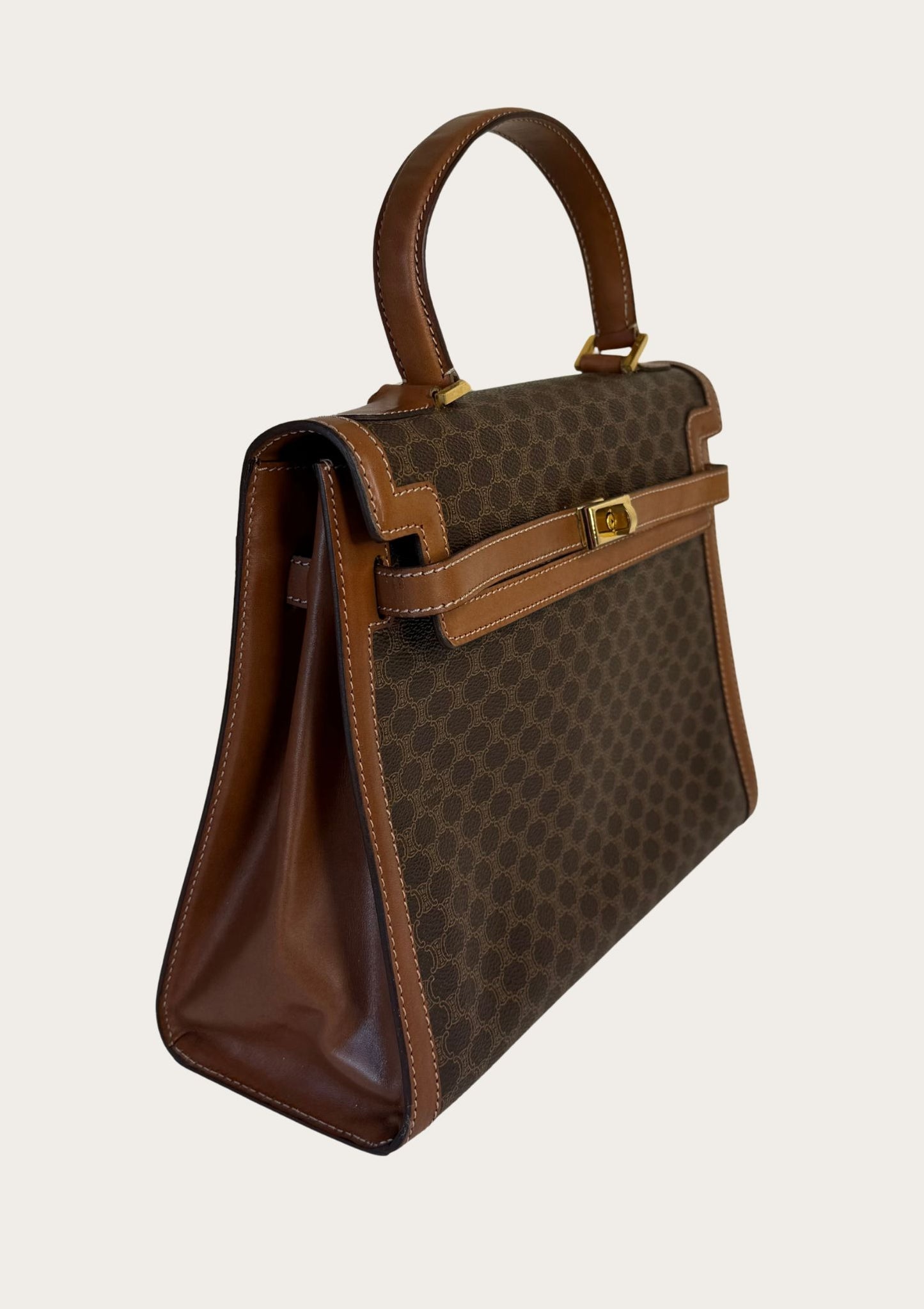 Authentic and vintage Celine top handle bag in macadam pattern