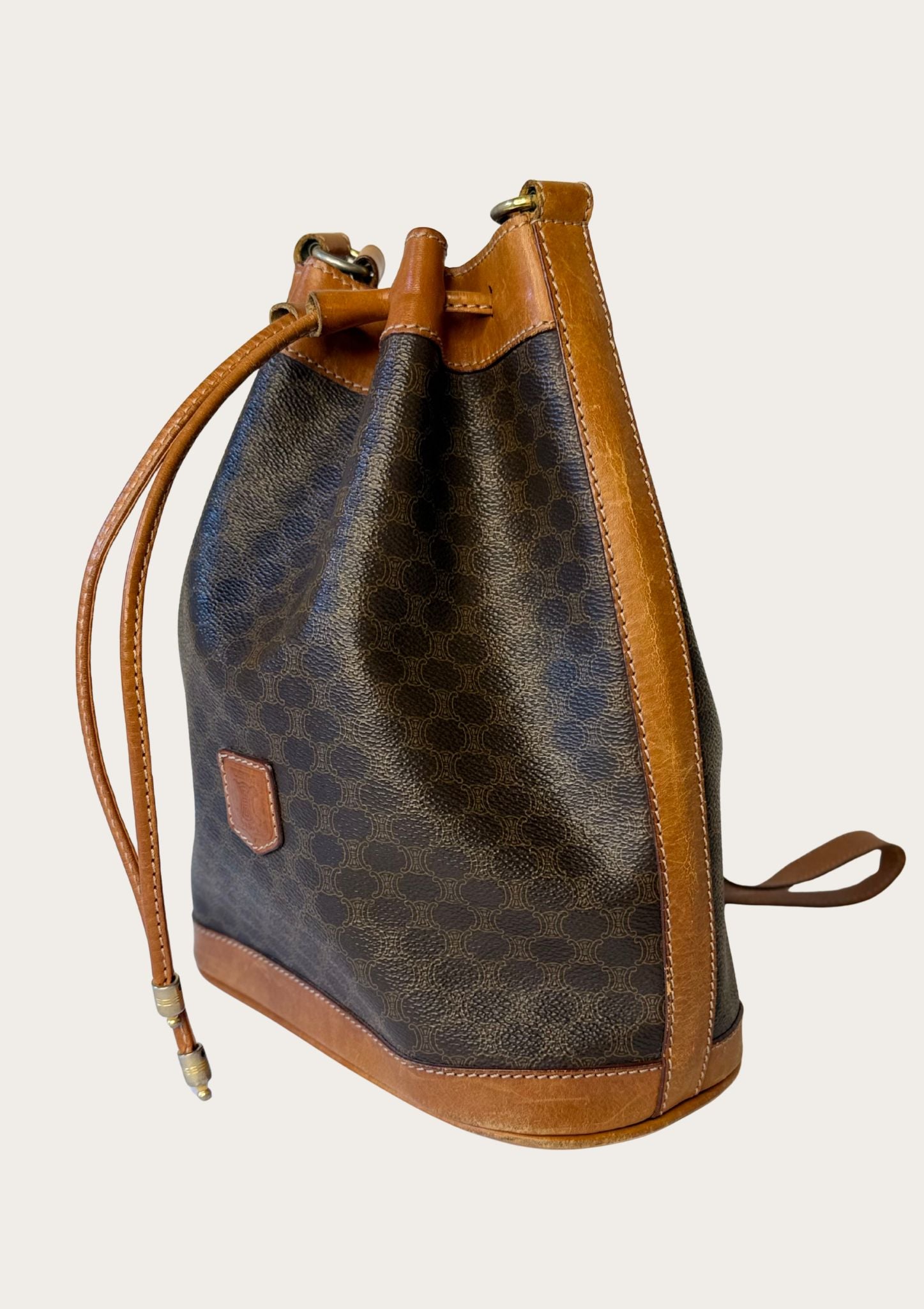 Genuine Celine bucket bag in macadam pattern with leather details