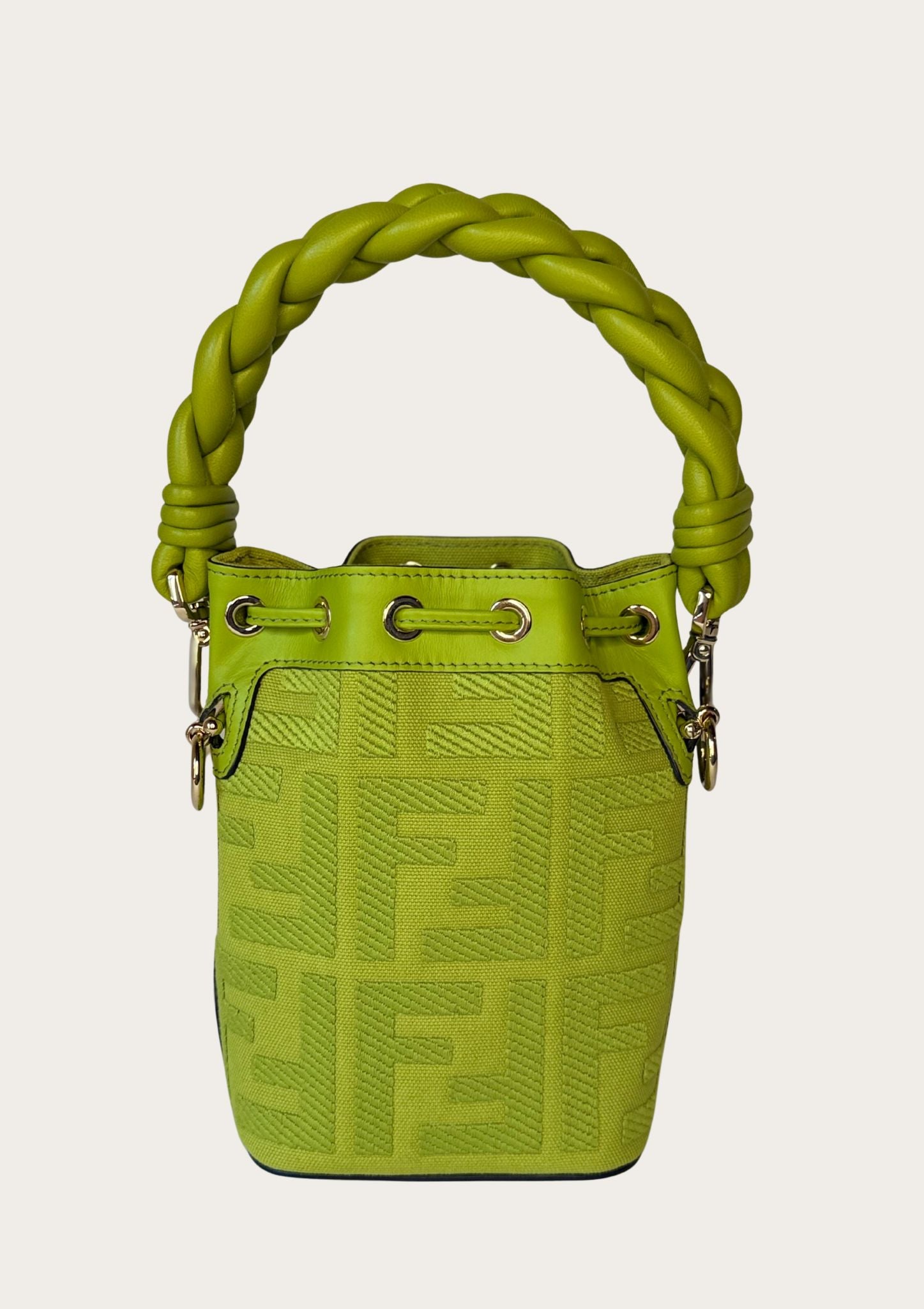 Authentic Fendi Mon Trésor Mini Bucket Bag in green canvas with leather details