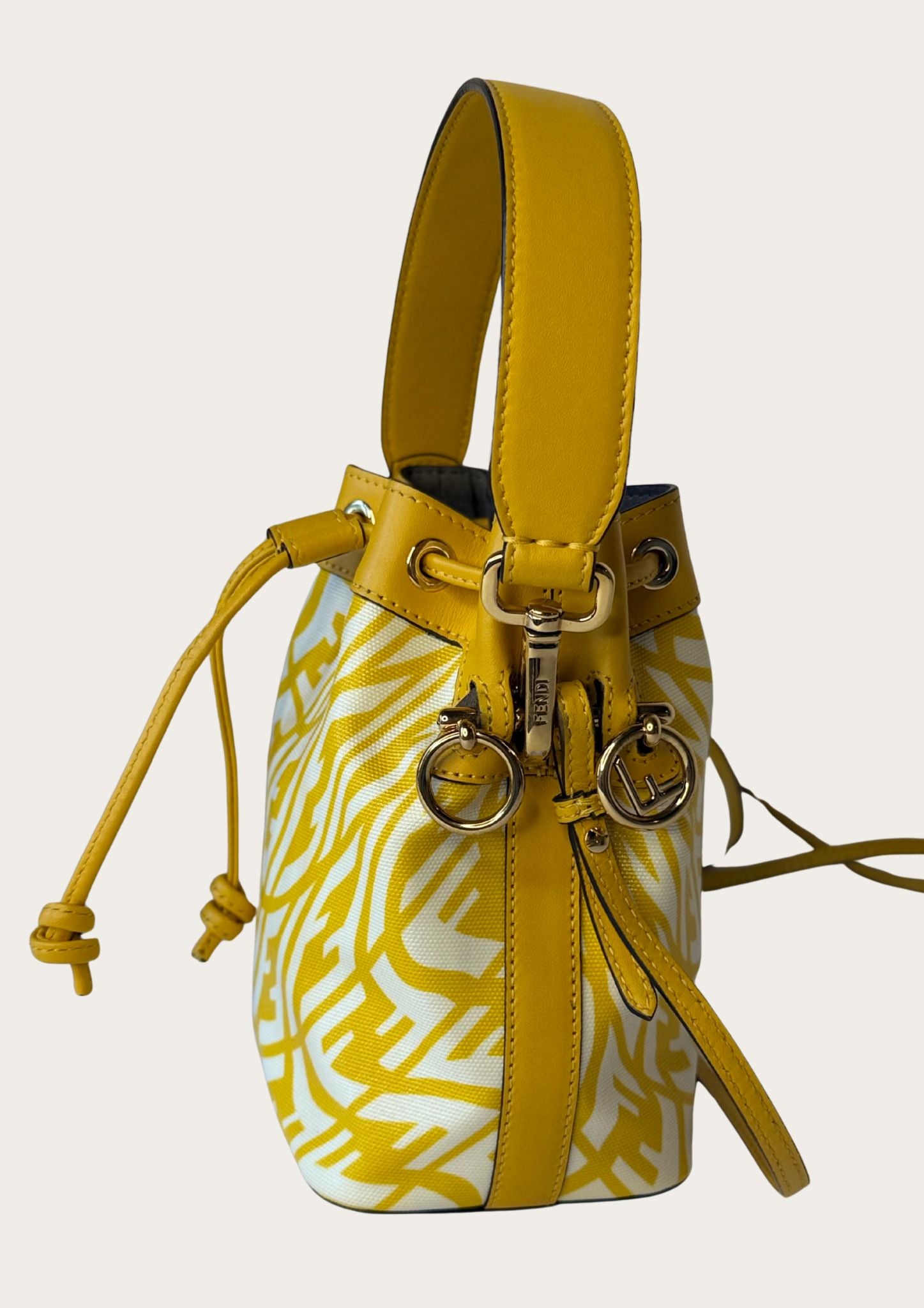 Genuine Fendi Mon Trésor Mini Bucket Bag in yellow and white canvas and leather