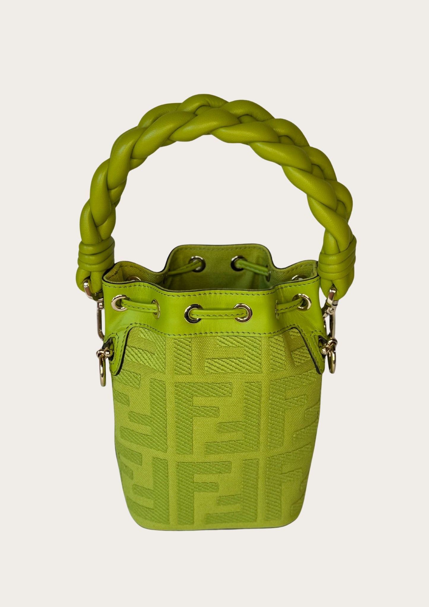 Authentic Fendi Mon Trésor Mini Bucket Bag in green canvas with leather details