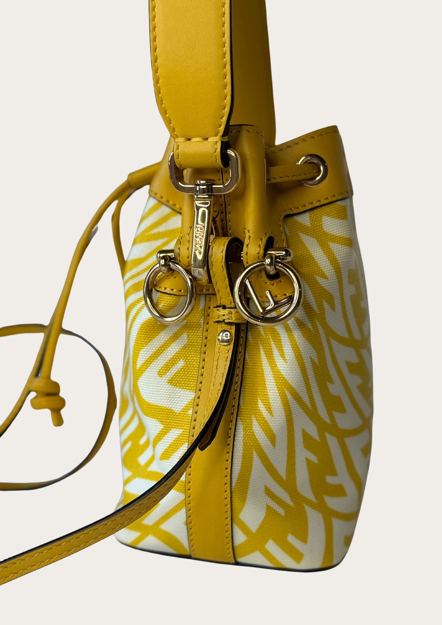 Genuine Fendi Mon Trésor Mini Bucket Bag in yellow and white canvas and leather