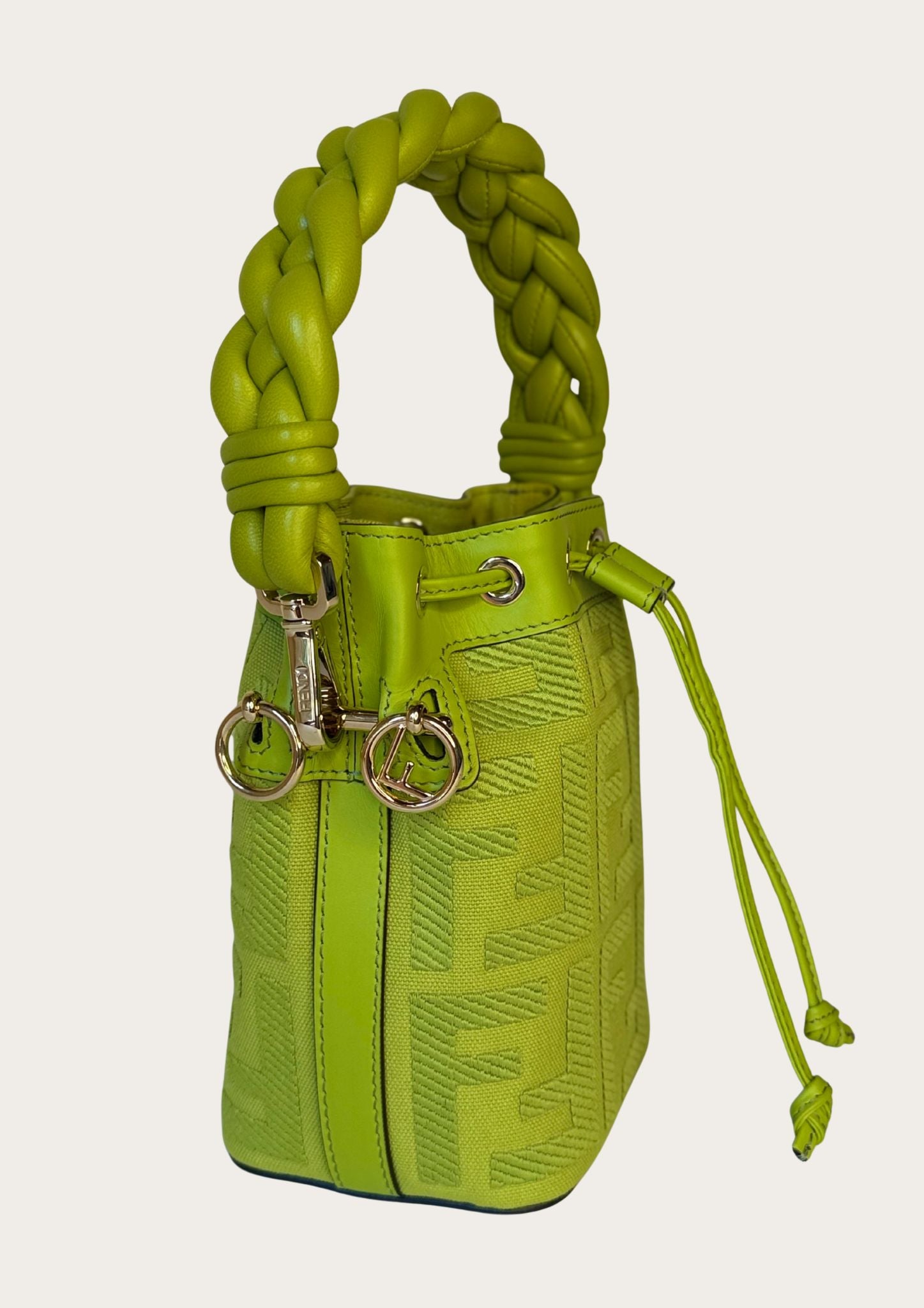Authentic Fendi Mon Trésor Mini Bucket Bag in green canvas with leather details