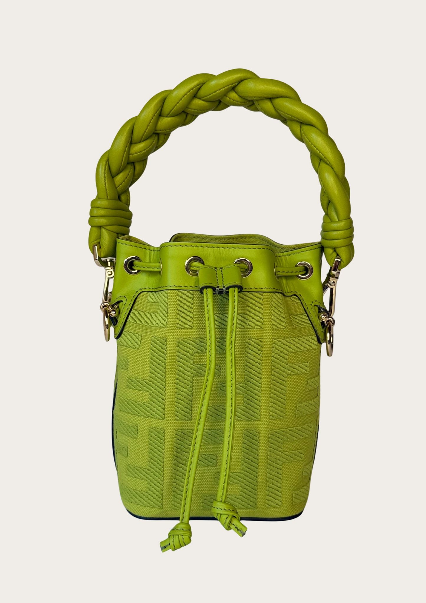 Authentic Fendi Mon Trésor Mini Bucket Bag in green canvas with leather details