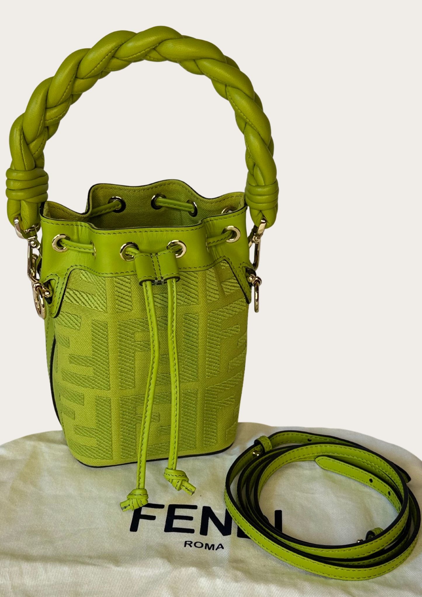 Authentic Fendi Mon Trésor Mini Bucket Bag in green canvas with leather details