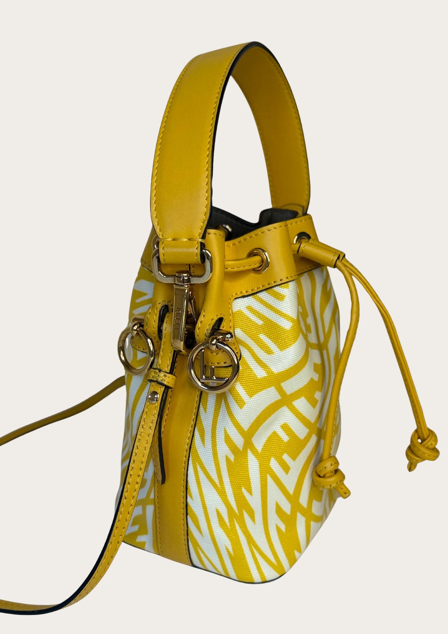 Genuine Fendi Mon Trésor Mini Bucket Bag in yellow and white canvas and leather