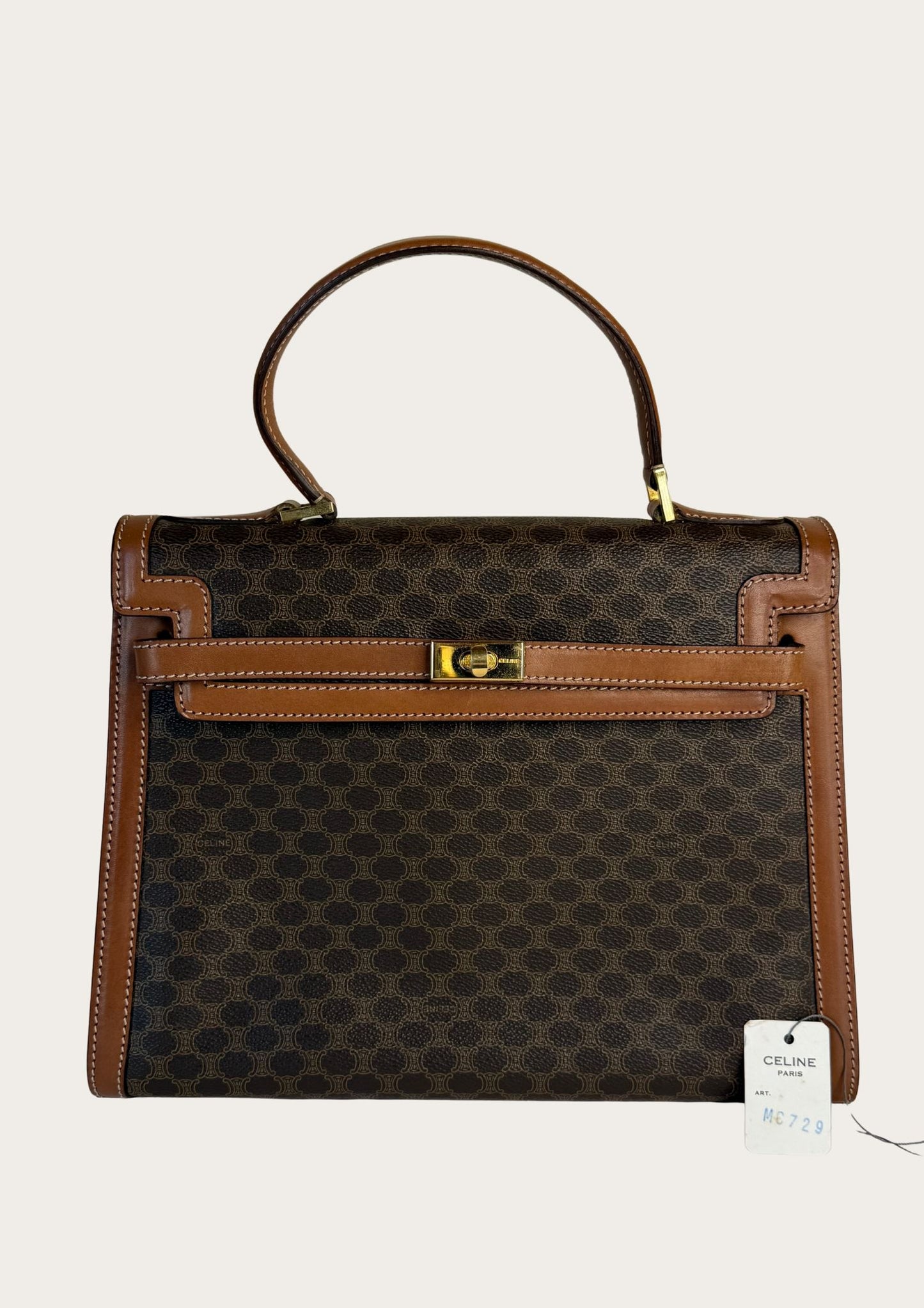 Authentic and vintage Celine top handle bag in macadam pattern